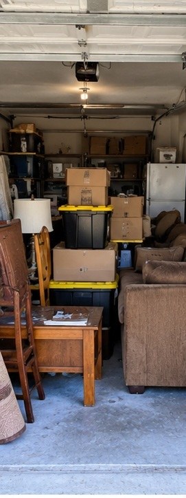Garage clutter before cleanout